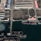 Left to right: KPN hovercraft, mystery ship, Krivak-class frigate, and a second hovercraft. A narrow patrol boat-type warship is tied up next to the Krivak, and a second of the class is in drydock at the bottom of the screenshot.